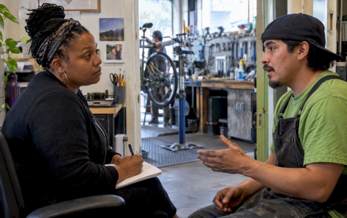 Manager listening during an employee complaint intake